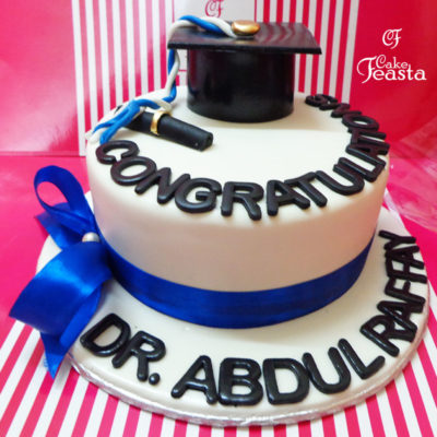 Blue Ribbon Cap Graduation Cake