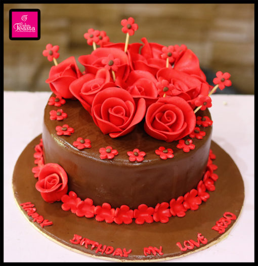 Red Flower On Brown Cake
